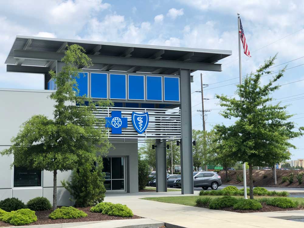 building with blue cross logo